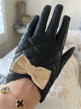 Black Quilted Leather Gloves with Beige Bow Accent